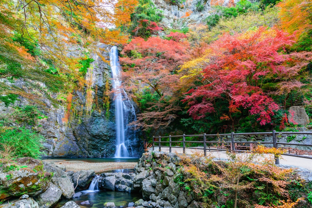 Scenic autumn view of Minoh Falls, one of the most popular Osaka romantic places for nature lovers