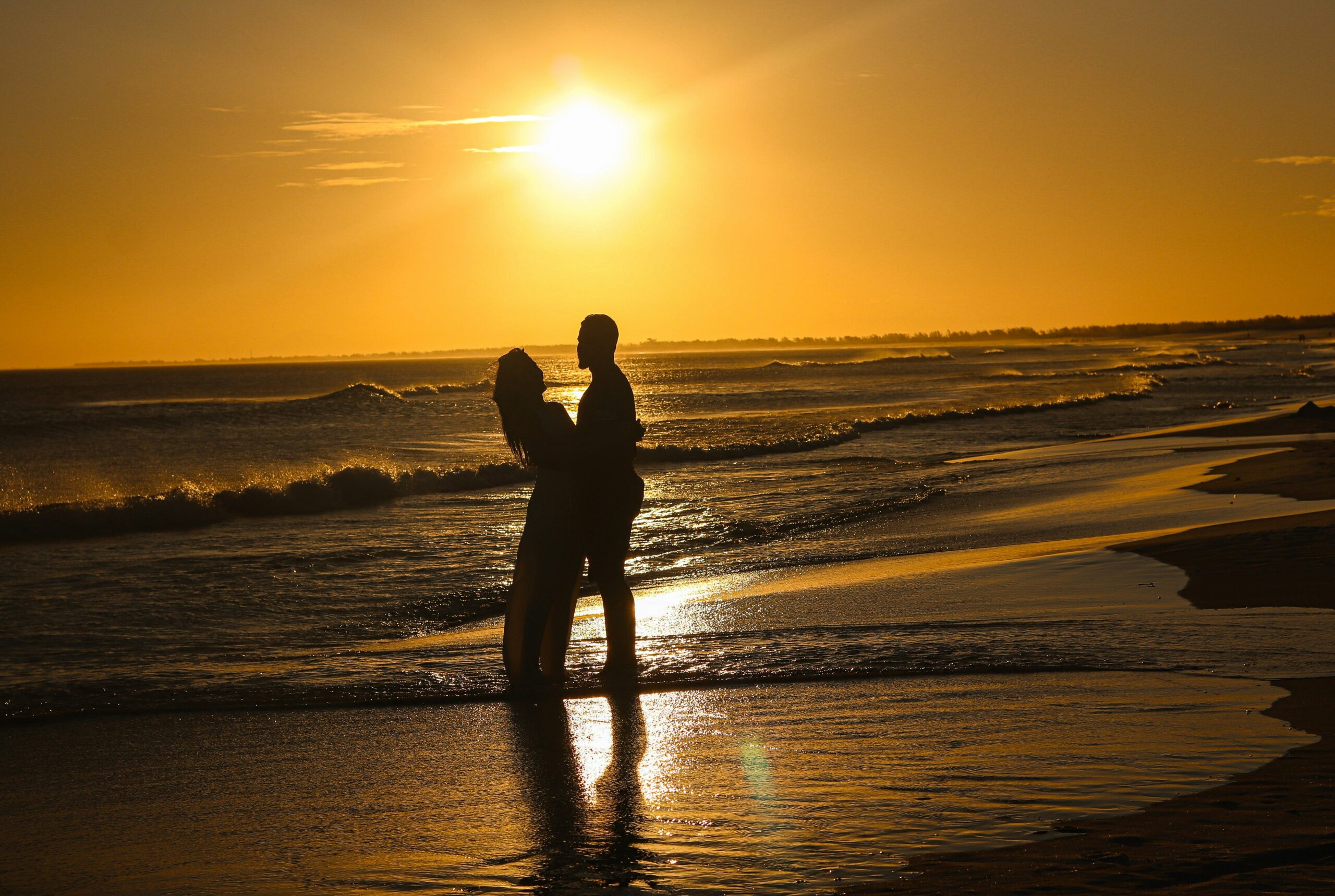 Romantic couple watching sunset at the most happening beach in Bali for honeymoon